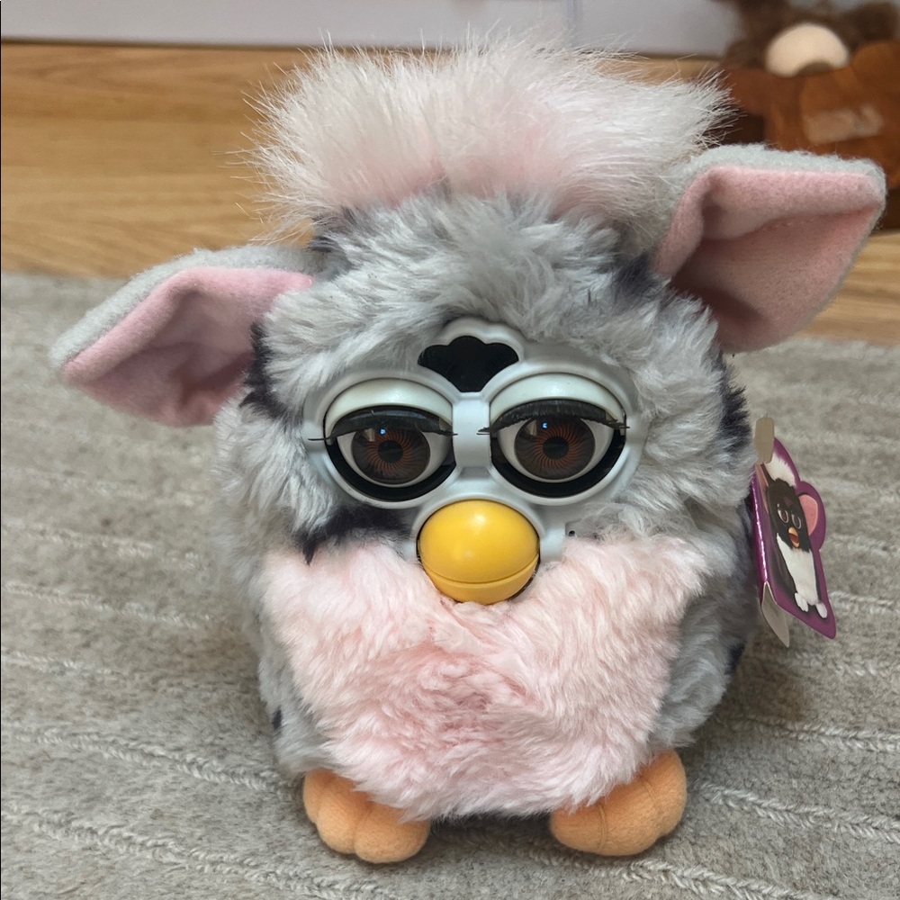 Gray and Pink Stuffed Animal Toy
